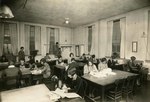 1920s: Carney Hall, Sewing class by Unknown