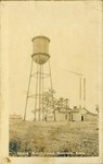 Water Tower in Scammon, Kansas by Ira Clemens