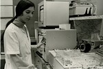 Woman Checking Samples by Unknown