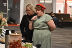 Guests Look at the Food Table by Rafael Tourinho Machado DE Almeida and Angel Abshire