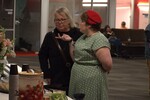 Guests Look at the Food Table by Rafael Tourinho Machado DE Almeida and Angel Abshire