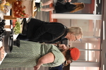 Guests Look at the Food Table by Rafael Tourinho Machado DE Almeida and Angel Abshire