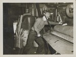 Man Working at Machine by Linda Wilson