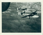 United States Eighth Army Air Force B-24 Liberators flying in formation by the 409th Bomb Squadron, 93rd Bomb Group by Unknown