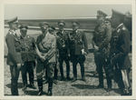 Adolf Hitler (third from left) and Hemann Goering (second from left) by Unknown