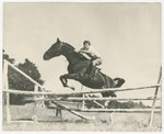 F 281 Ken Hughes and his horse jumping a fence by Unknown